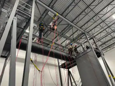 SPRAT Level 1 rope access instructor guiding student on ropes in Calgary