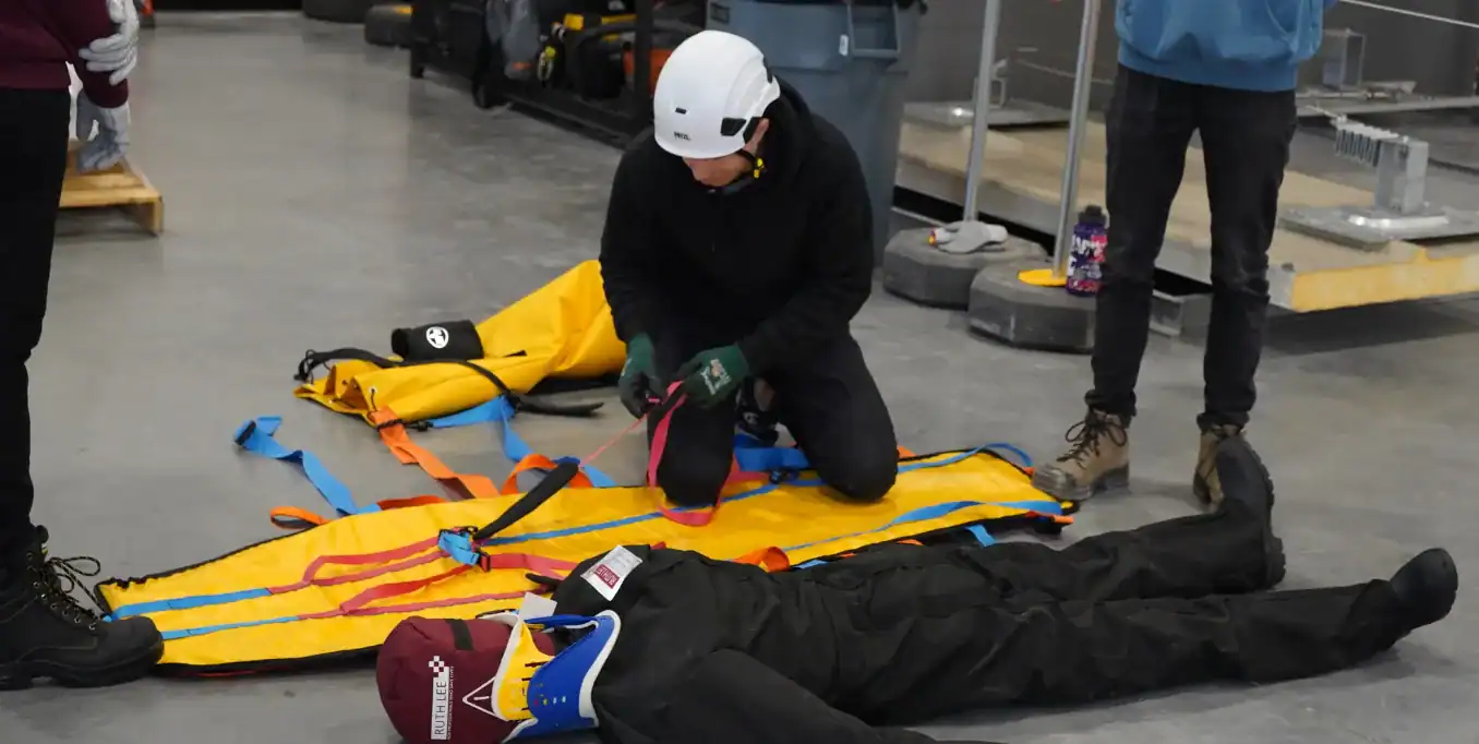 Instructor demonstrating safe lifting techniques during GWO BST Manual Handling training.